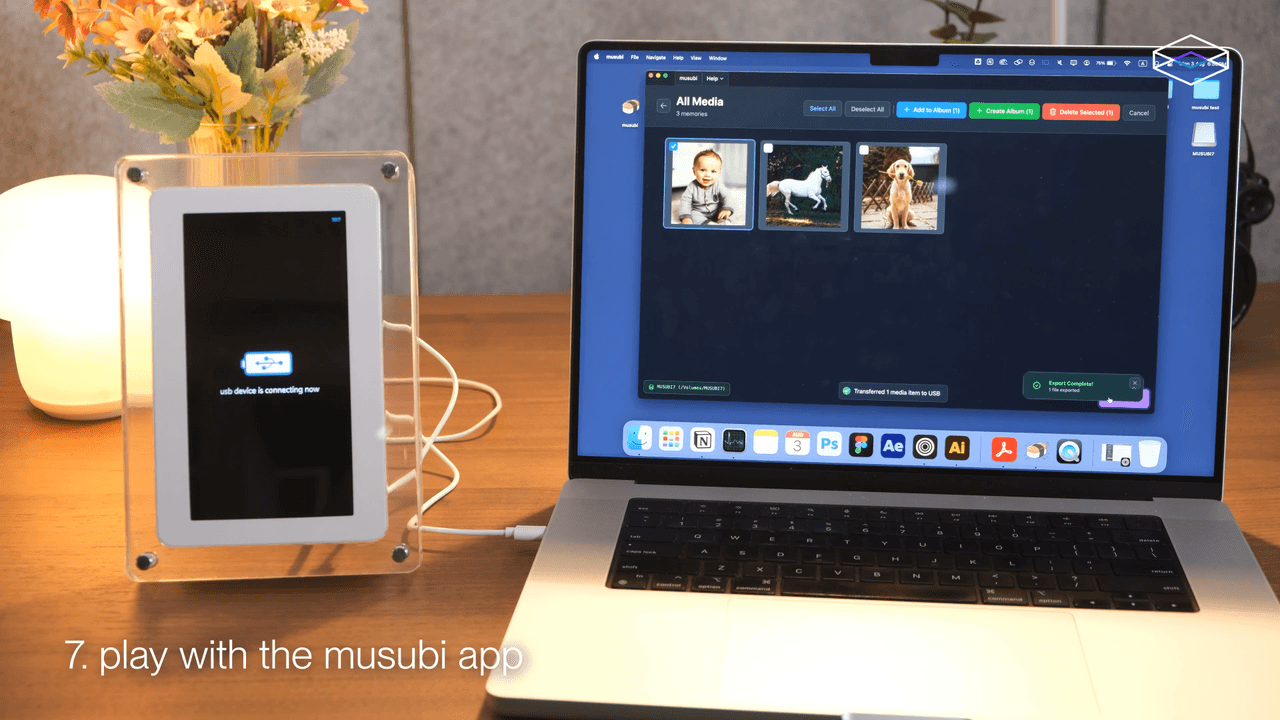 The musubi app reporting that one media item was transferred and the export is complete